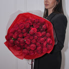 Carminia luxury bouquet — RDC Red Piano roses in velvet-textured deep crimson hand-tied arrangement | Ecoroses Los Angeles