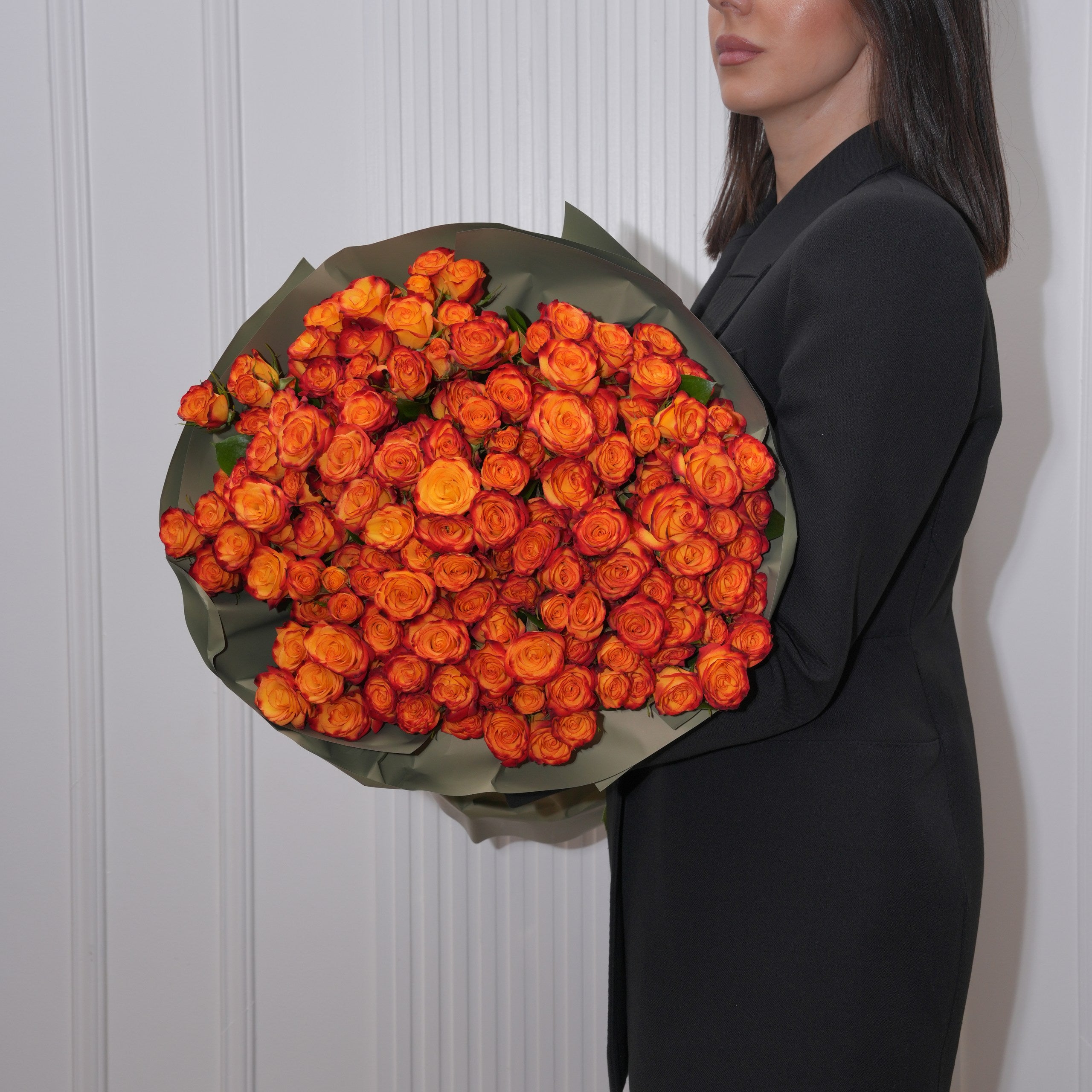 Ambrina luxury bouquet — saturated orange star baby roses in a small-blossom hand-tied arrangement | Ecoroses Los Angeles