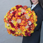Fiammetta luxury bouquet — star baby roses in yellow, orange, sahara, and hot pink hand-tied sunset arrangement | Ecoroses Los Angeles