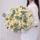 Bianca — ivory roses & lisianthus bouquet, hand-tied by Ecoroses | flower delivery Los Angeles