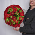 Letizia luxury bouquet — RDC Red Eye roses and Princess Midori green chrysanthemums in a bold red-and-lime hand-tied arrangement | Ecoroses Los Angeles